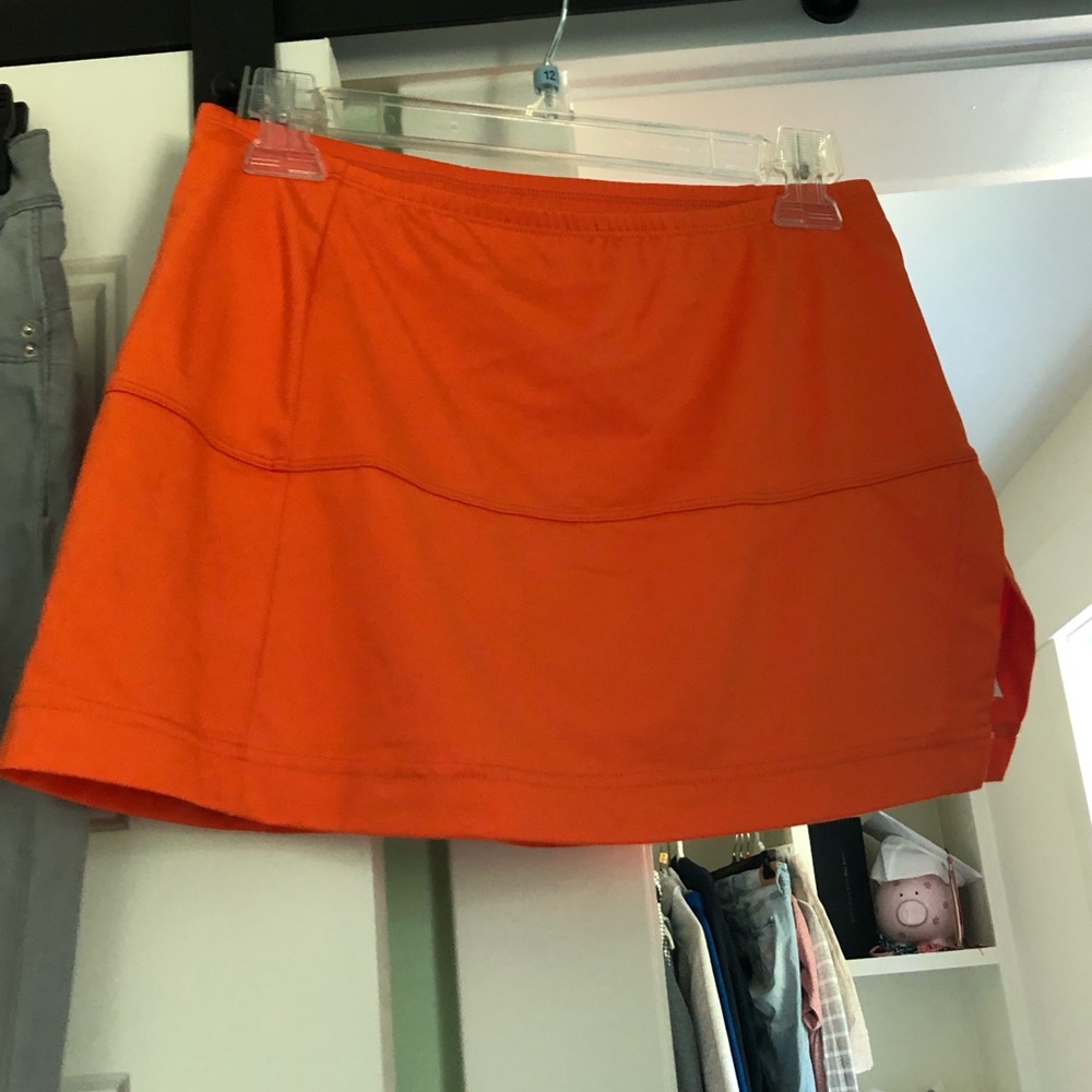 Orange tennis skirt